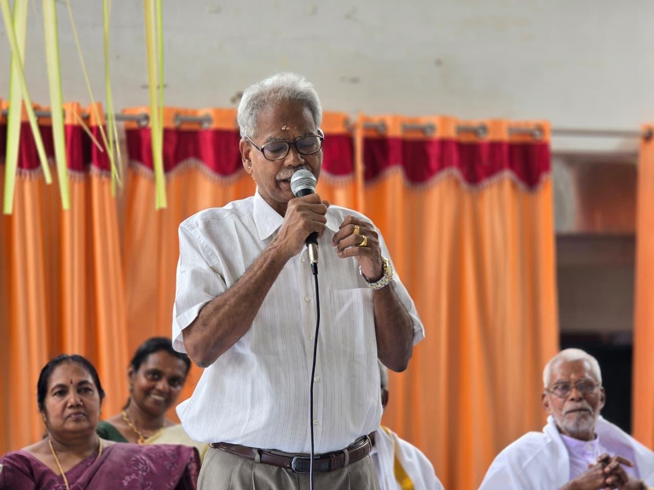 Rtn RC Nair addressing a community gathering
